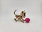 Gattino scheletrico con gomitolo rosa – Halloween Edition