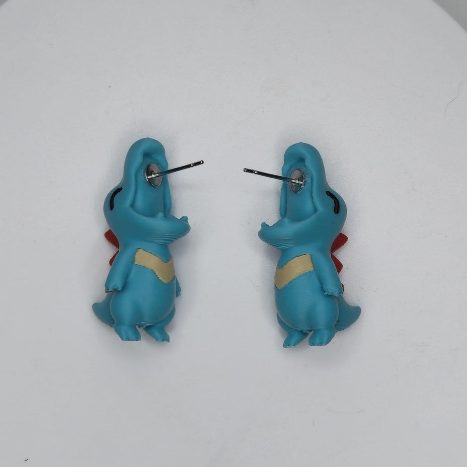 Orecchini cucciolo di dinosauro