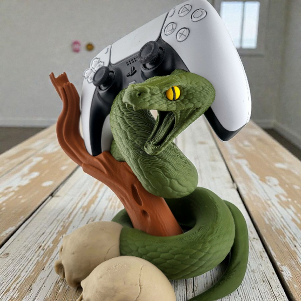 Supporto decorativo a tema serpente – Portacontroller da scriva