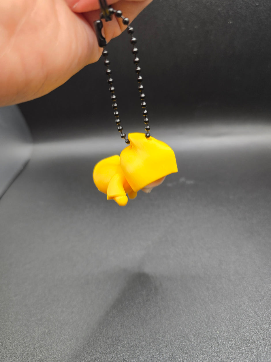 Portachiavi Halloween – Mini scheletro con cappuccio giallo