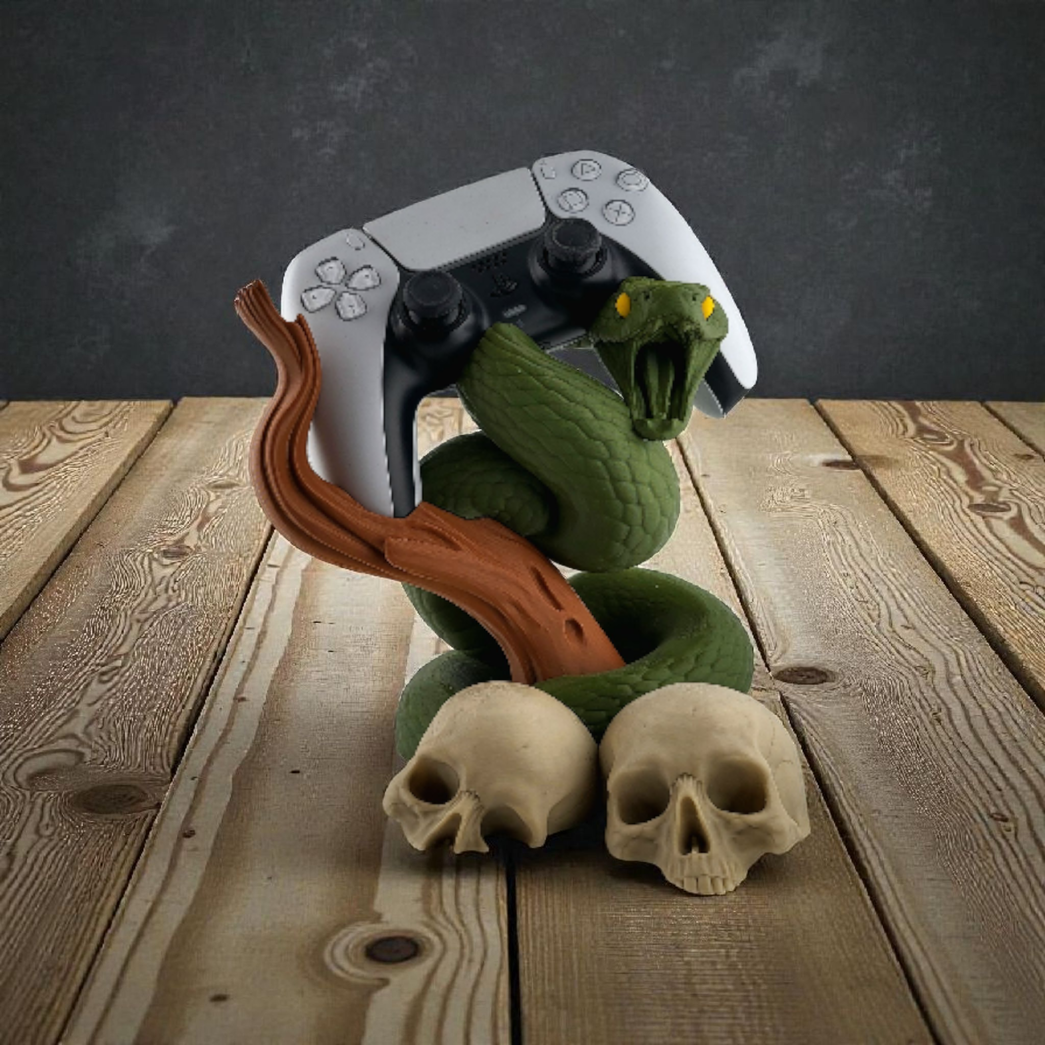 Supporto decorativo a tema serpente – Portacontroller da scriva